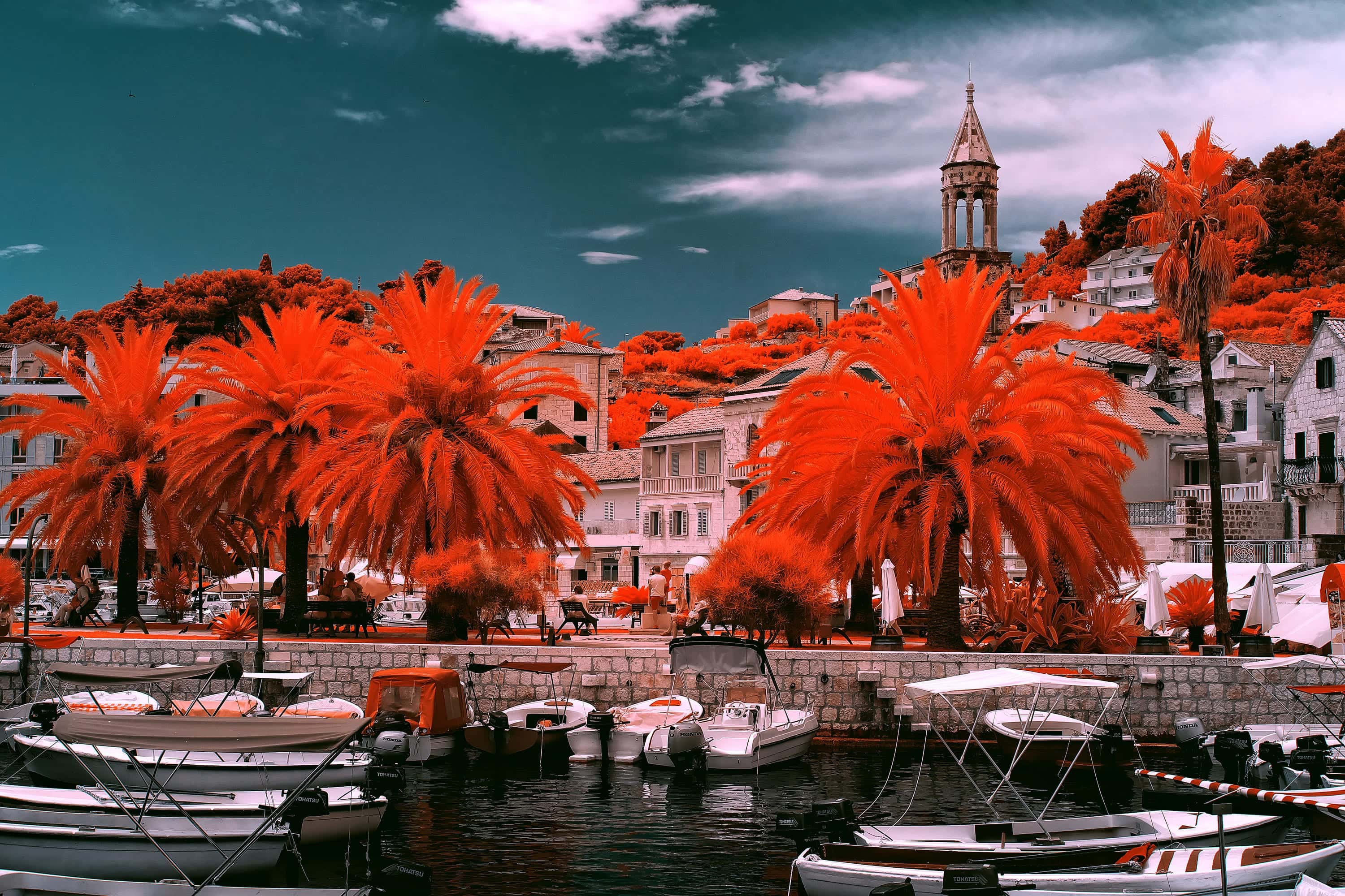 Small boats moored along the harbour quay in Hvar Town, on the Croatian island of Hvar, photographed in near-infrared light.